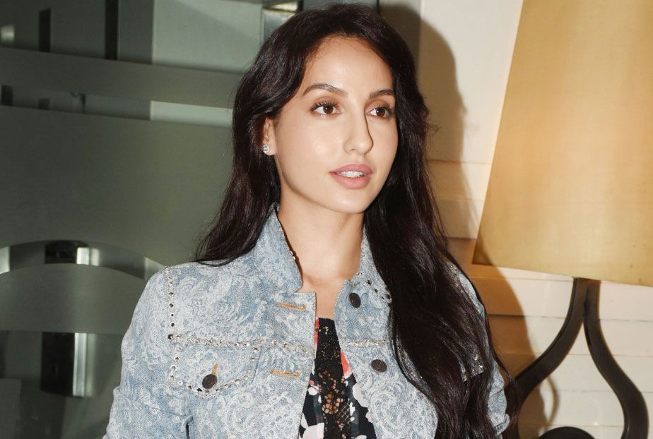 Nora Fatehi’s Newest OOTD Makes Monsoon Dressing Look Stylish & Easy