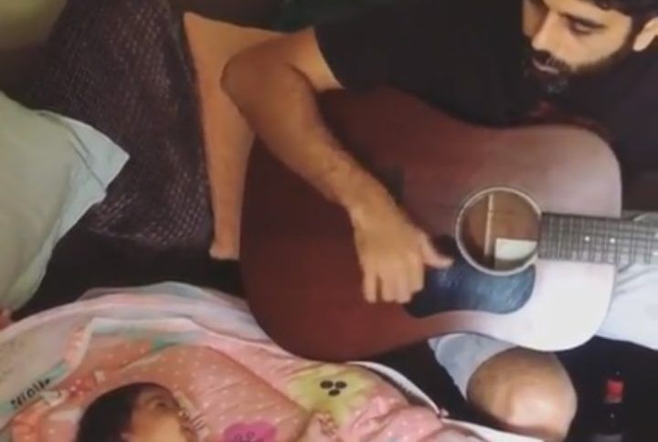 VIDEO: Sameera Reddy’s Husband Entertains His Baby Girl By Playing The Guitar