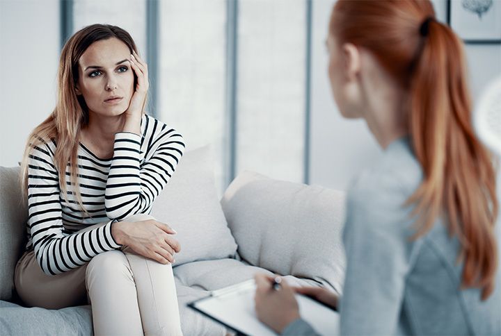 Woman consulting psychiatrist about her social anxiety disorder by Photographee.eu | www.shutterstock.com