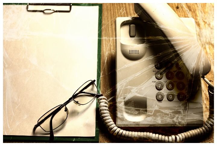 Violence telephone call cracked glass concept by alexkich | www.shutterstock.com