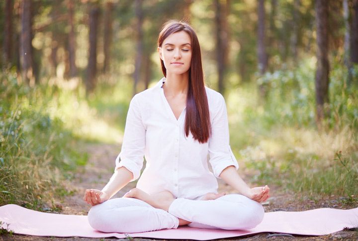 Woman Meditating in Nature (Source: www.shutterstock.com)