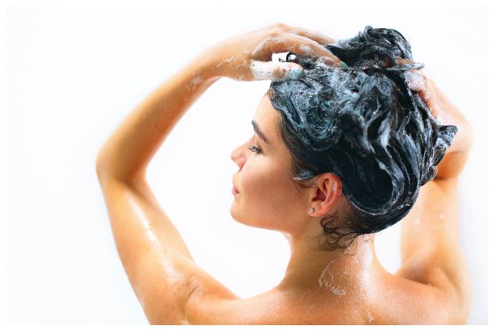 Washing hair with shampoo by Subbotina Anna | www.shutterstock.com