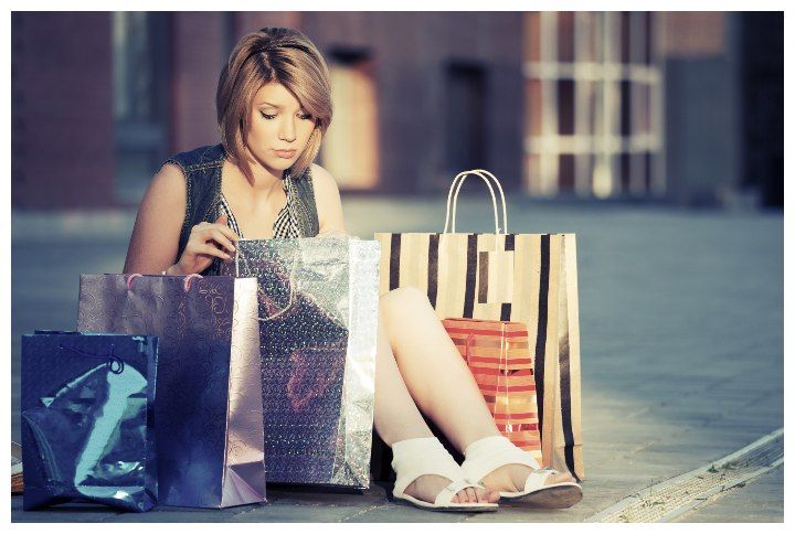 Young fashion woman with shopping bags by wrangler | www.shutterstock.com