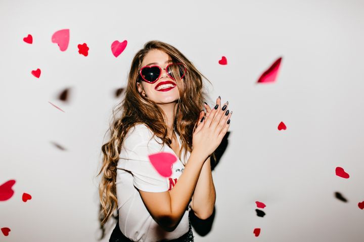 Easy-Going Girl With Long Hair Expressing Positive Emotions In Valentine's Day By Look Studio | www.shutterstock.com