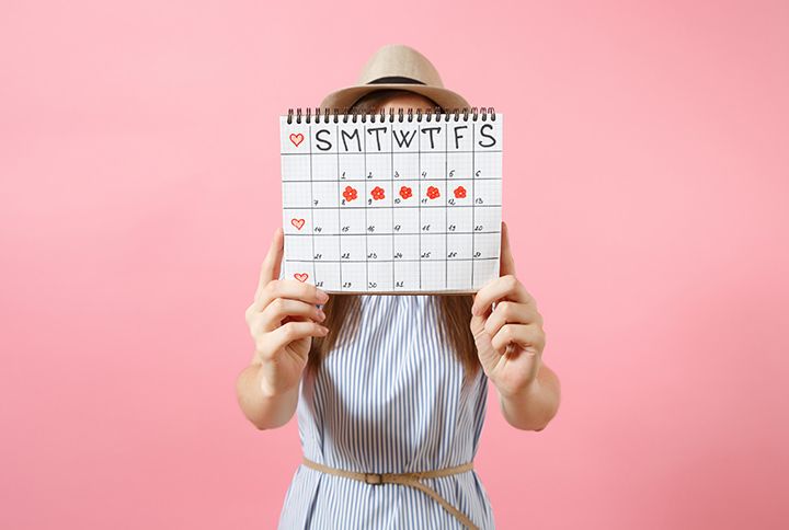 Woman with a period calendar for checking menstruation days by ViDi Studio | www.istock.com