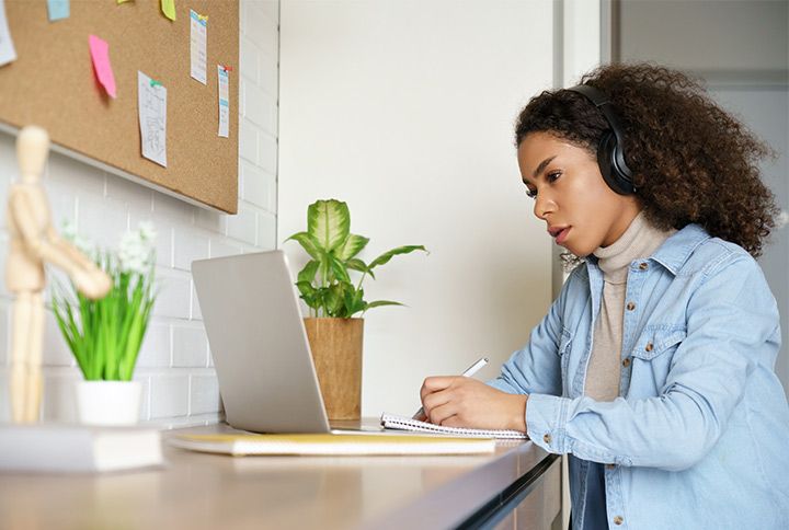 Teen Girl Learning With Tutor Online by insta_photos | www.shutterstock.com