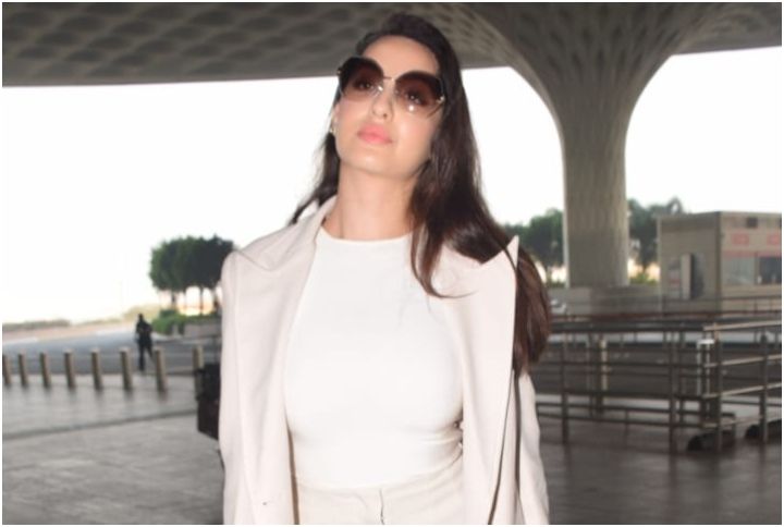 Nora Fatehi Wears A Classic Luxe Outfit To The Airport