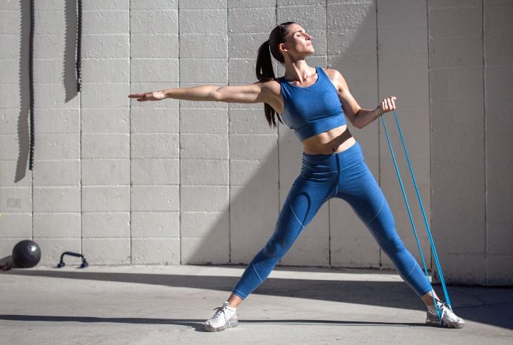 Want To Tone And Strengthen Your Arms? Try These Resistance-Band Exercises