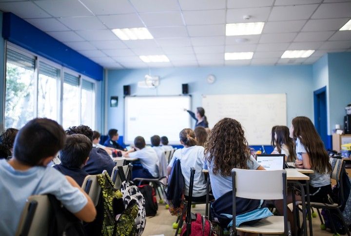 Students in a classroom By David Fuentes Prieto | www.shutterstock.com