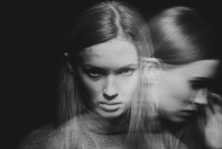 Back and white multiple exposure of beautiful young woman with mood disorder By Photographee.eu | www.shutterstock.com