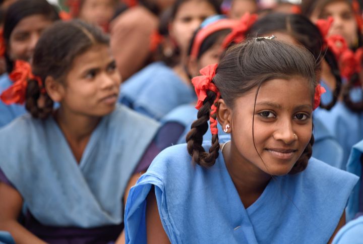 Girls in school by CRS PHOTO | www.shutterstock.com