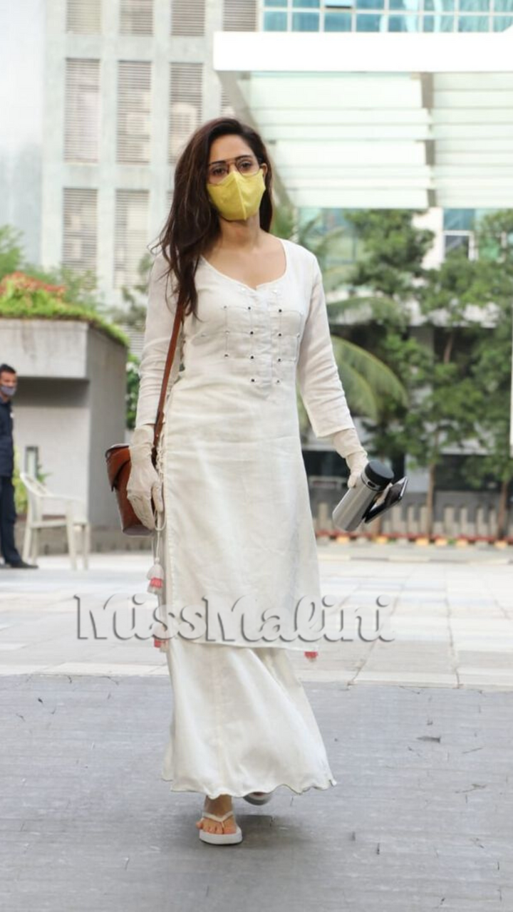 Nushrratt Bharuccha in a yellow face mask