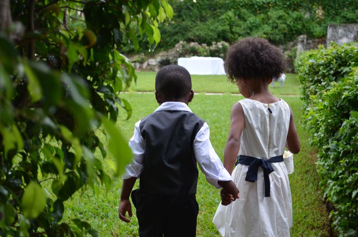 Cute flower girl and ring bearer By Holly Mazour | www.shutterstock.com