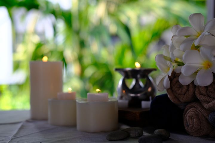 Spa setting and aromatherapy candles By Witsanu S | www.shutterstock.com
