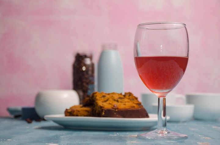 Red wine and plum cake By sanandshaji | www.shutterstock.com