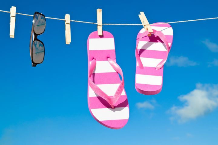 Drying washed flip-flops. By Christopher Elwell | www.shutterstock.com