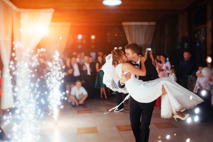 Happy bride and groom and their first dance By Standret | www.shutterstock.com