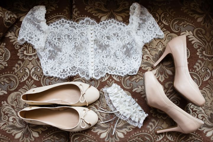 Bridal accessories and lace jacket By ivkatefoto | www.shutterstock.com