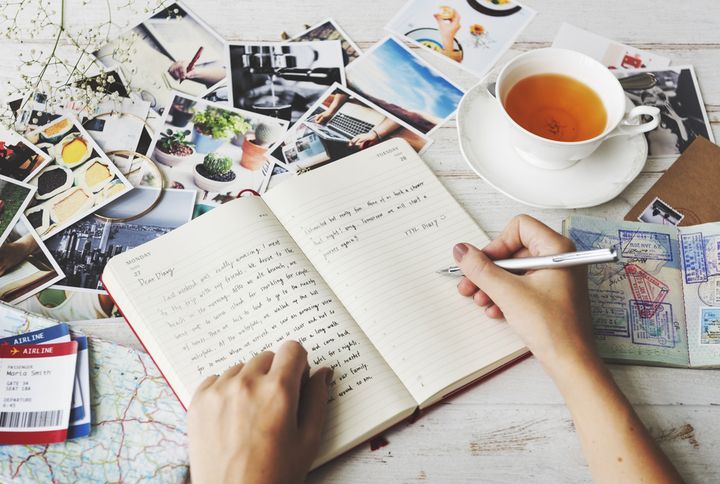 Writing in a journal By Rawpixel.com | Shutterstock
