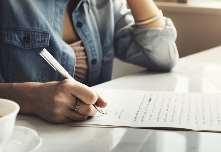 Writing A Letter (Image Courtesy: Shutterstock)