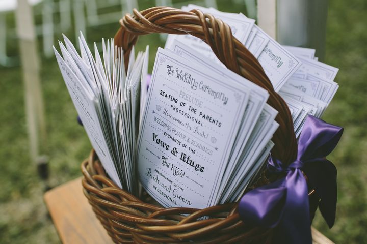 Wedding ceremony programs in a basket By Jenaphotography | www.shutterstock.com