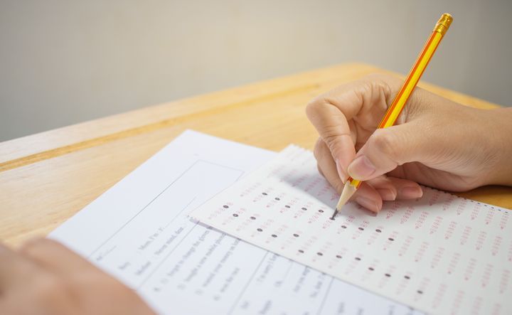 Practice old exam papers. By smolaw | www.shutterstock.com