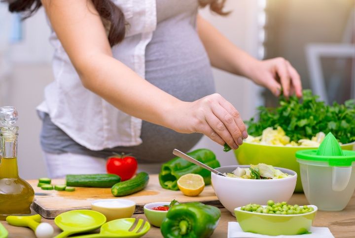 Pregnant Woman Eating Healthy By Anna Om | www.shutterstock.com