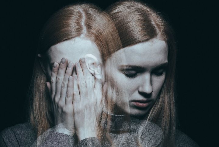 Young girl covering her face with her hands after reaching a peak of her depression By Photographee.eu | www.shutterstock.com
