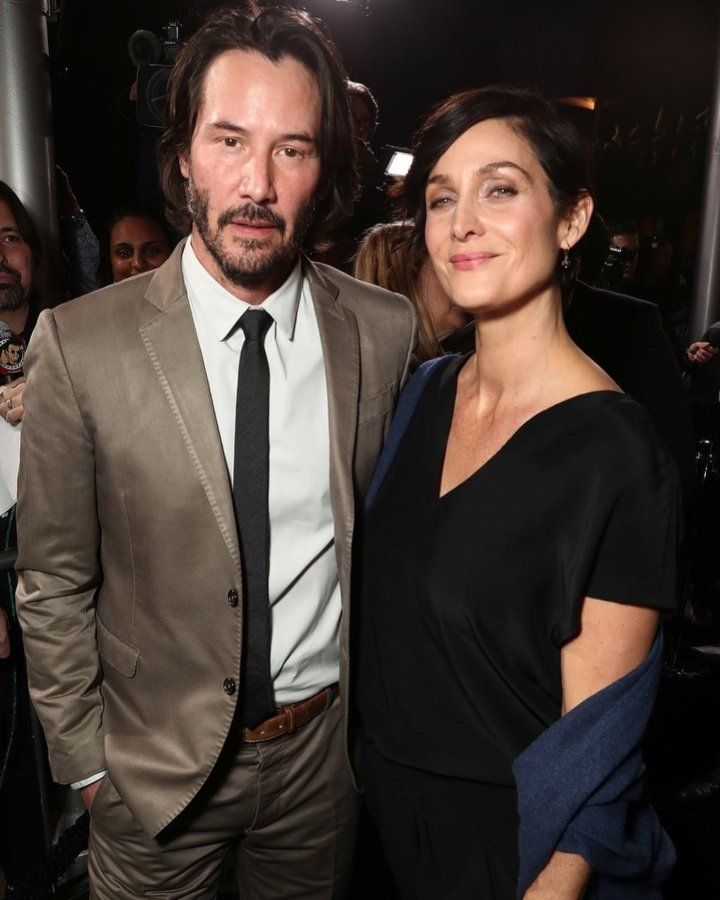 Keanu Reeves and Carrie-Anne Moss (Source: Instagram | @carrieanne.moss)