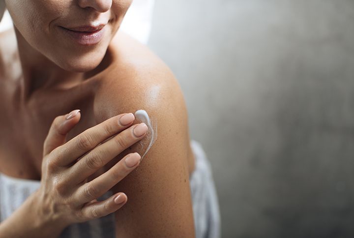 Woman Applying Body Lotion By LStockStudio | www.shutterstock.com