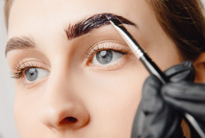 Henna Eyebrows In Beauty Salon by Parilov | www.shutterstock.com