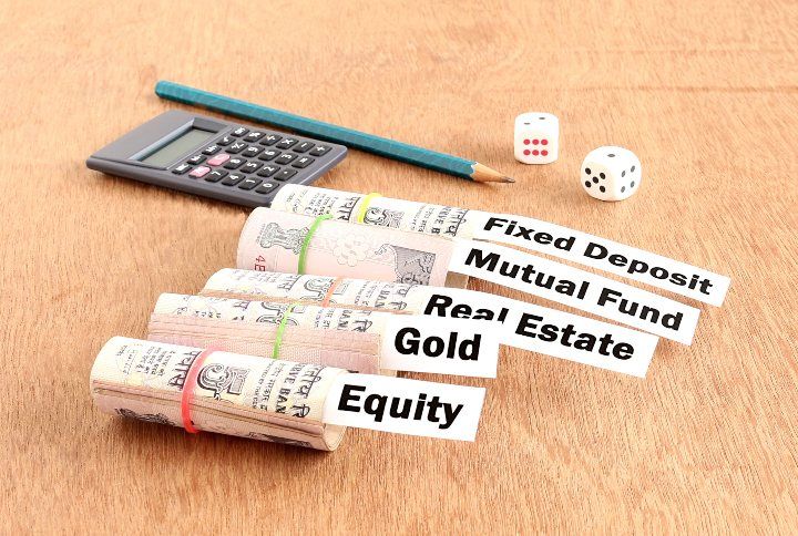 Investment in equity, fixed deposit, mutual fund, gold and real estate By GreenTree | www.shutterstock.com