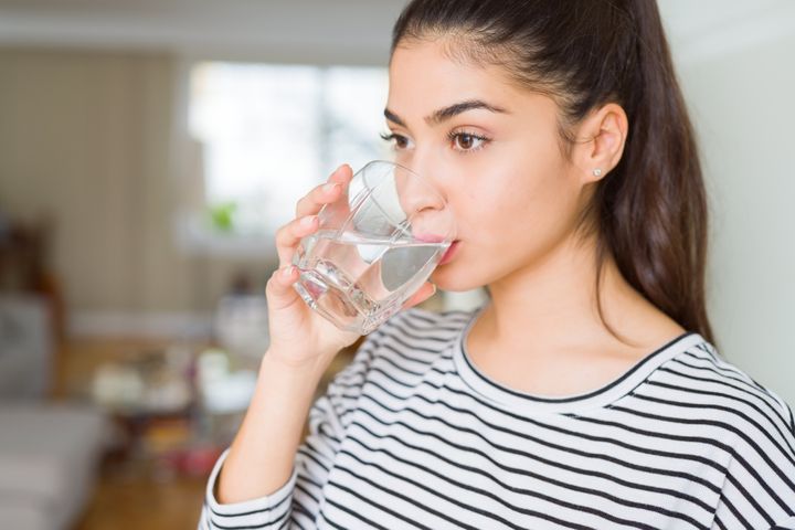 Drink lots of water. By Krakenimages.com | www.shutterstock.com