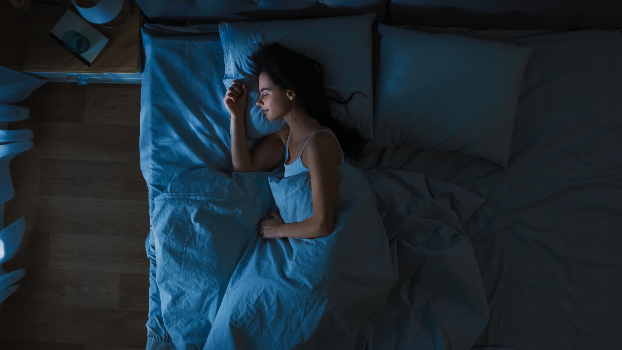 Young woman sleeping By Gorodenkoff | www.shutterstock.com