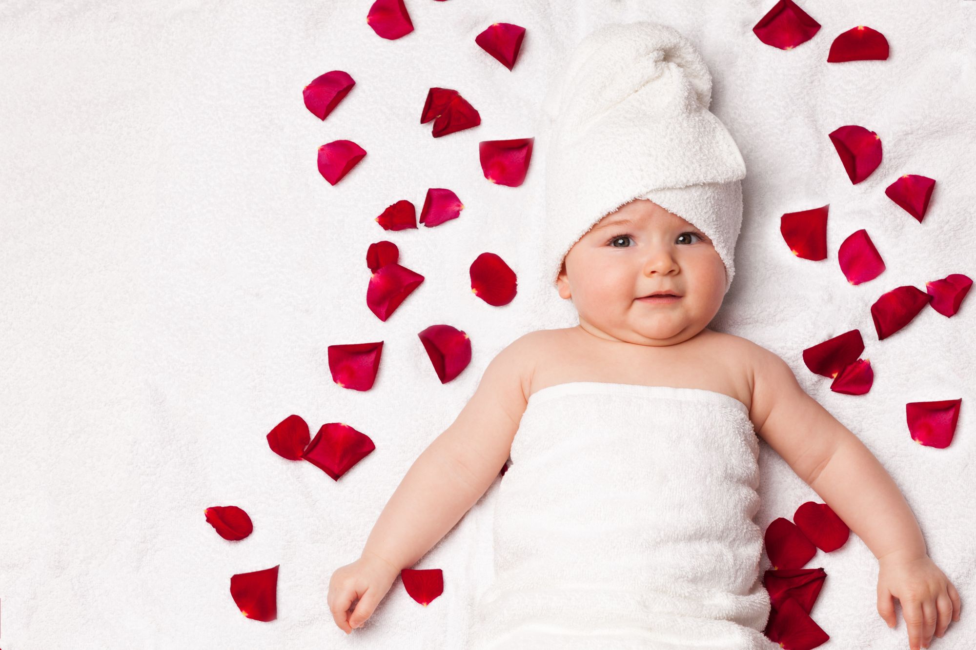 Baby Wrapped In A Towel by  Francesco83 | www.shutterstock.com