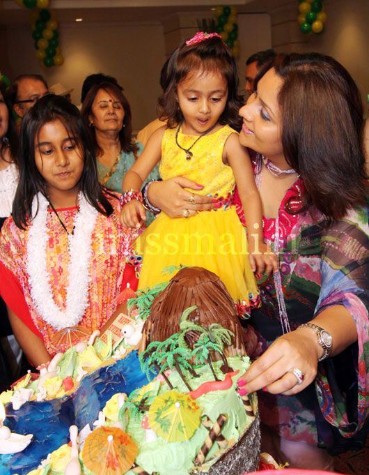 Palak and daughters Sheneya (in yellow) and Tanisha