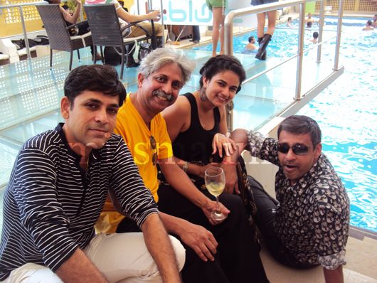 Ashwin Deo (extreme right) with friends by the pool