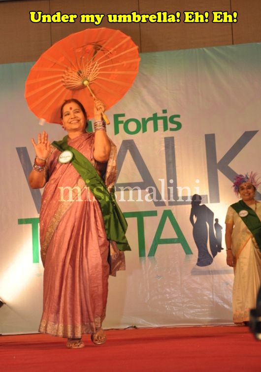 A contestant is all smiles as she waves to the crowd