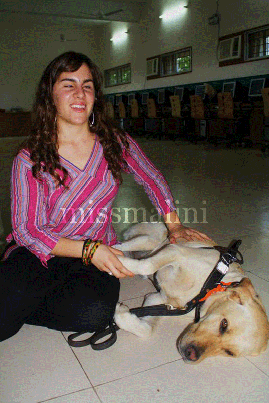 Alba is from Spain volunteering as a JAWS instructor. Her seeing eye dog is from Michigan.