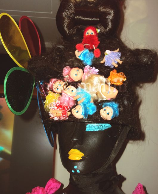 multiple dismembered dolls heads decorate Munshi Man