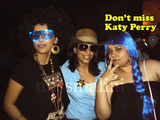 Parveen and Sukhi Dusanj with a friend dressed up as Katy Perry