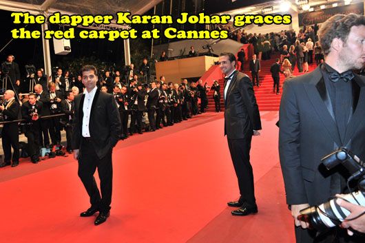 Karan Johar at the Cannes red carpet felicitated by Chivas as the brand ambassado