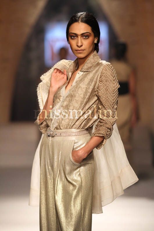 Model Tina Chatwal walking the ramp for Tarun Tahiliani at the Grand Finale