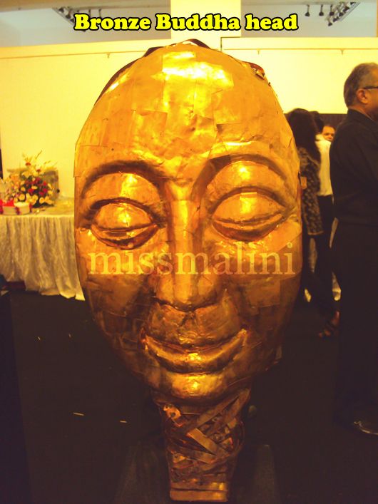 This copper sculpture of Buddha's head is called THE THINKER