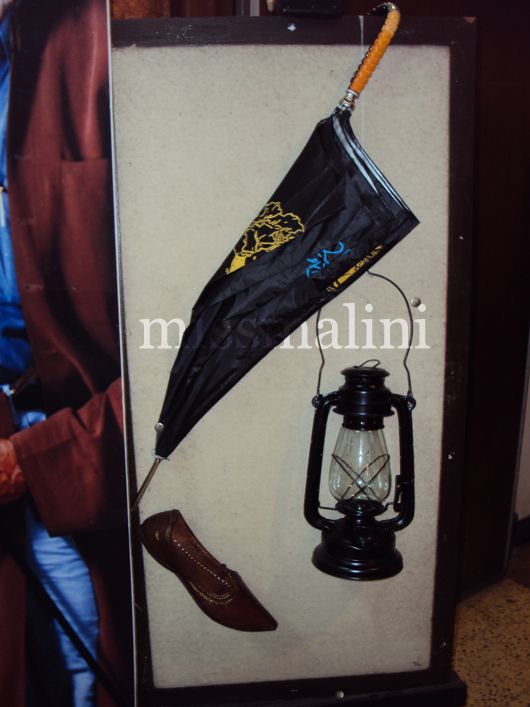 Husain's umbrella, shoes and lantern