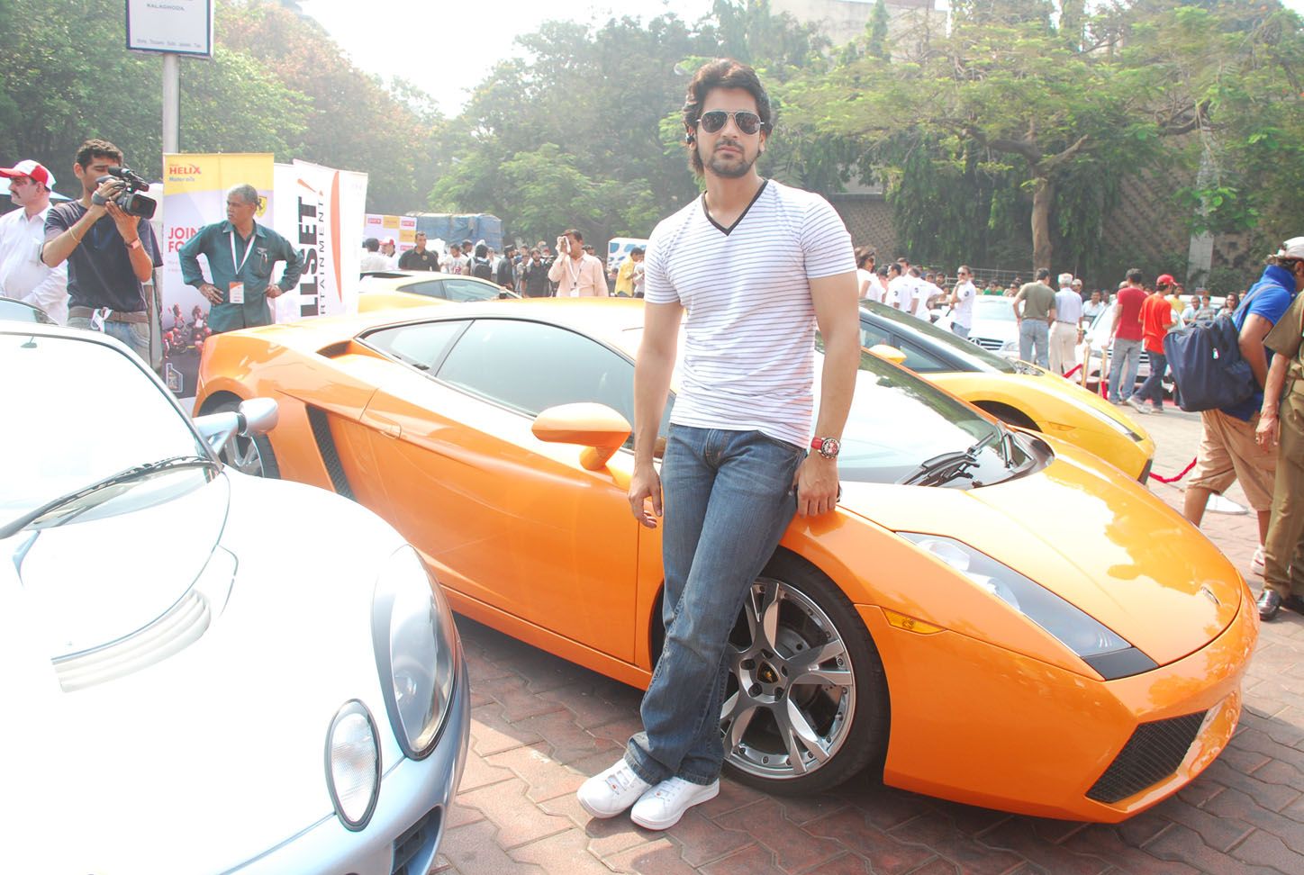 Arjan Bajwa posing with Gallardo Coupe