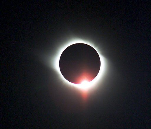 A total solar eclipse is seen in Jiuquan, in China's western Gansu province Friday Aug 1, 2008. Millions of Chinese along the ancient Silk Road gathered Friday to gaze at a total solar eclipse, an event traditionally fraught with superstitious meaning coming one week before the start of the Beijing Olympics.