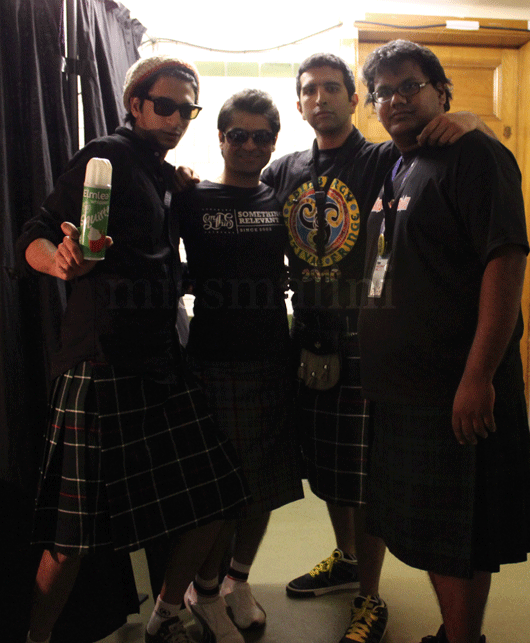 Posing in Kilts. Had to do a gig in them!
