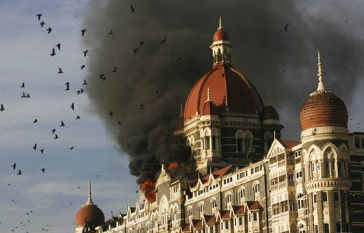 The Taj Palace Hotel in flames